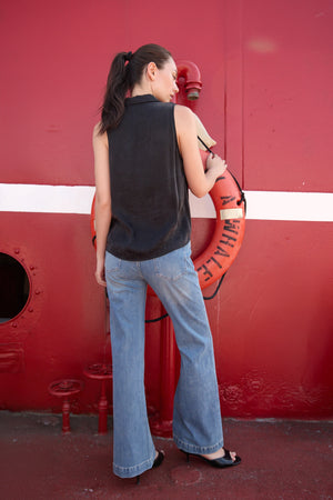 Du and Berry Twist Collared Top in Black sleeveless casual top worn with blue jeans