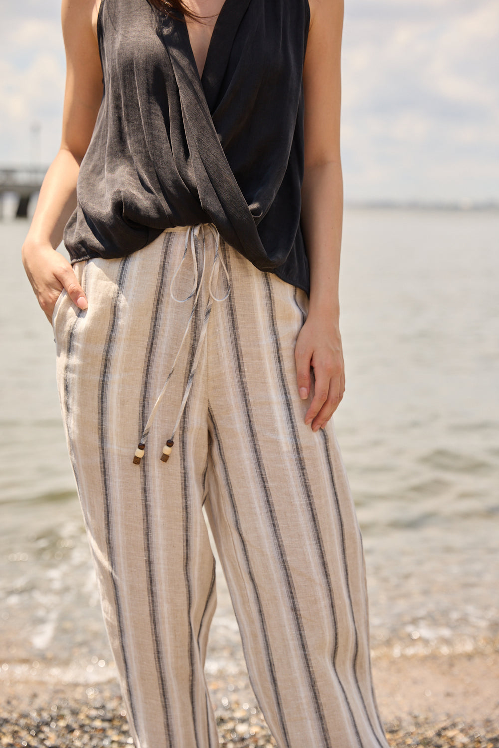 Du & Berry wide leg beach pants for women in beige with vertical stripes and drawstring waist