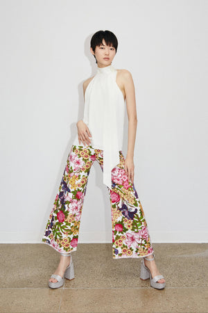 Model Cat wearing Du & Berry Floral Symphony Jeans with Moon Silk White Halter Top