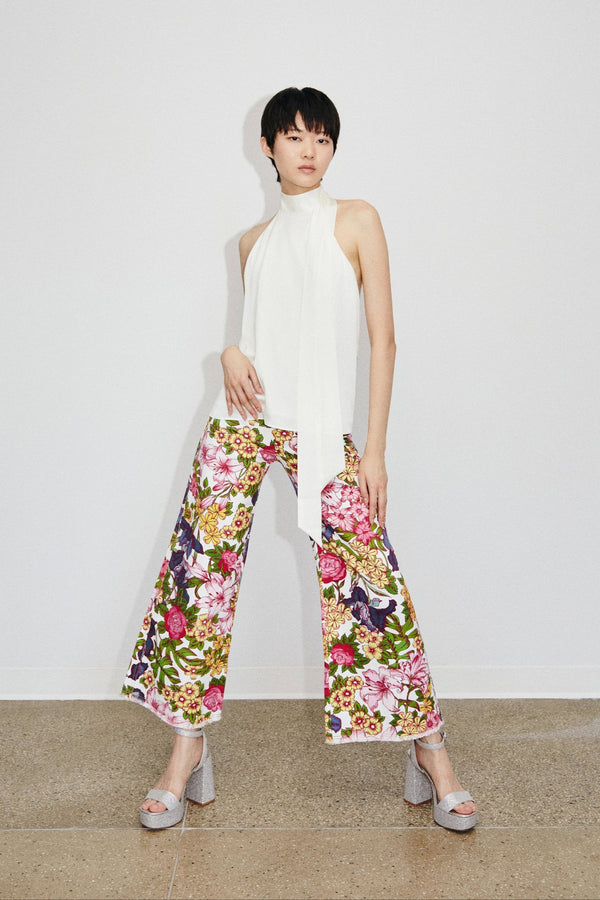 Model Cat wearing Du & Berry Floral Symphony Jeans with Moon Silk White Halter Top
