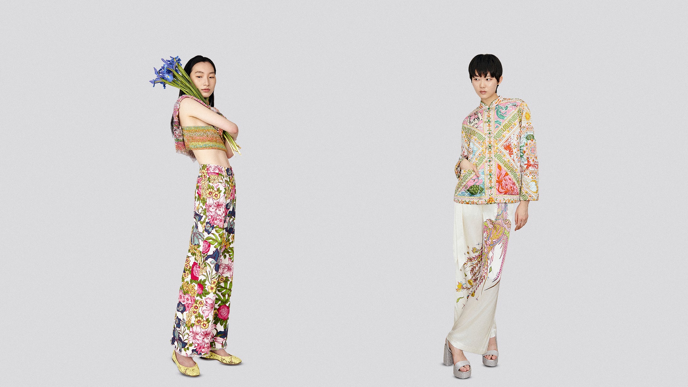 Du & Berry Homepage Hero for desktop screens featuring two models wearing Du & Berry's floral jeans and one of a kind turtleneck top and the Four Divine Creatures Print Jacket with the Phoenix Print Silk Trousers