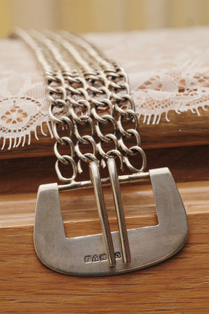 Du & Berry curated vintage - detail view sterling silver belt buckle and four-row chain belt with two prongs and silversmith hallmarks