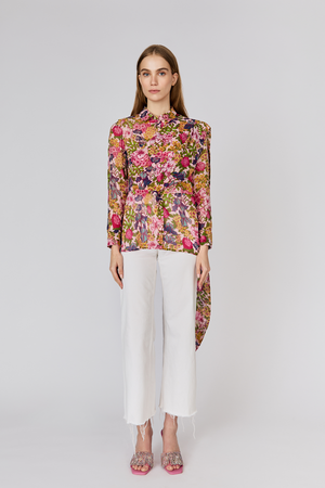 Model wearing Du & Berry Floral Symphony Silk Chiffon Pink Button Up Blouse with scarf detail with white jeans and pink heels