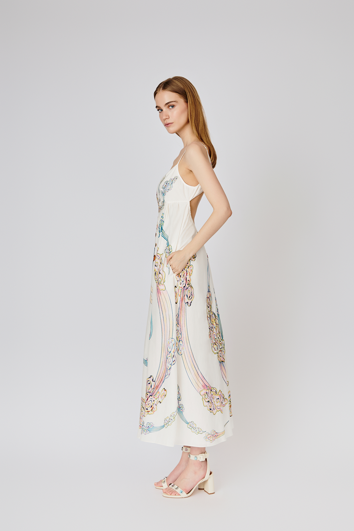 Model side view of Du & Berry Nuwa Canopy White Silk and Cotton Open Back Dress