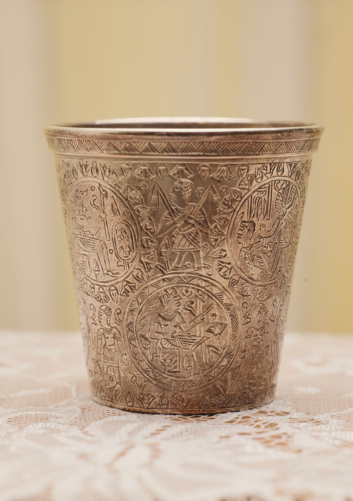 Detailed view Egyptian Revival Sterling Silver Cup from Du & Berry's curated vintage collection. Image shows close-up view of Egyptian etchings all over cup.