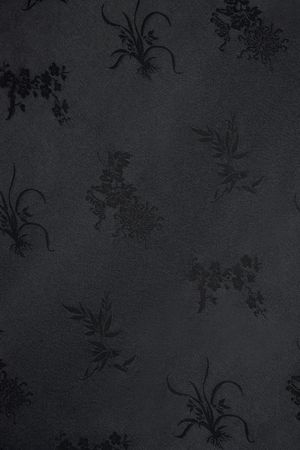 Close-up texture of Du & Berry Black Jacquard Midi Skirt with floral jacquard pattern