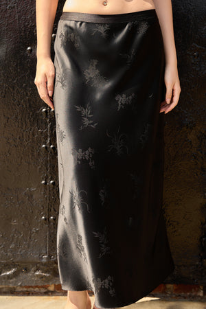 Du & Berry Black Jacquard Midi Skirt with subtle floral pattern and smooth satin finish
