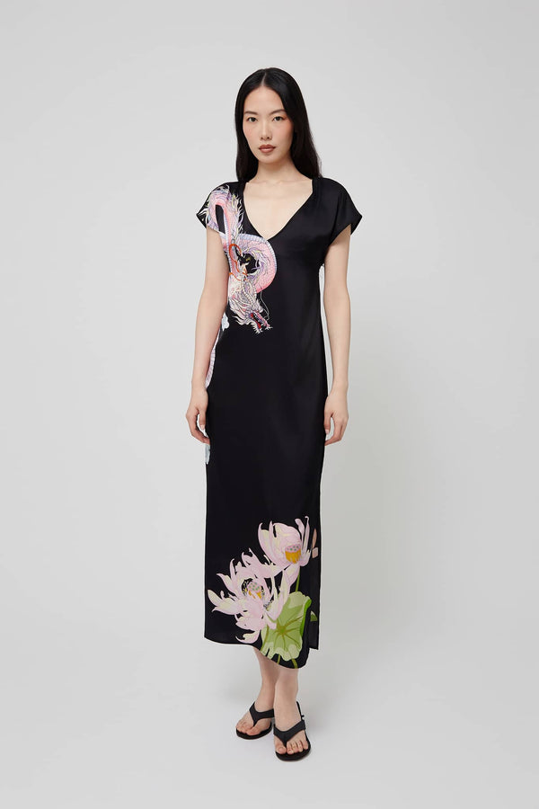 Front view: black silk open-back midi dress with floral design from Du & Berry