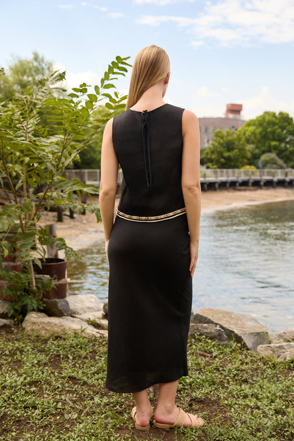 Du & Berry Black Linen Top Skirt Set worn by woman standing near waterfront outdoors