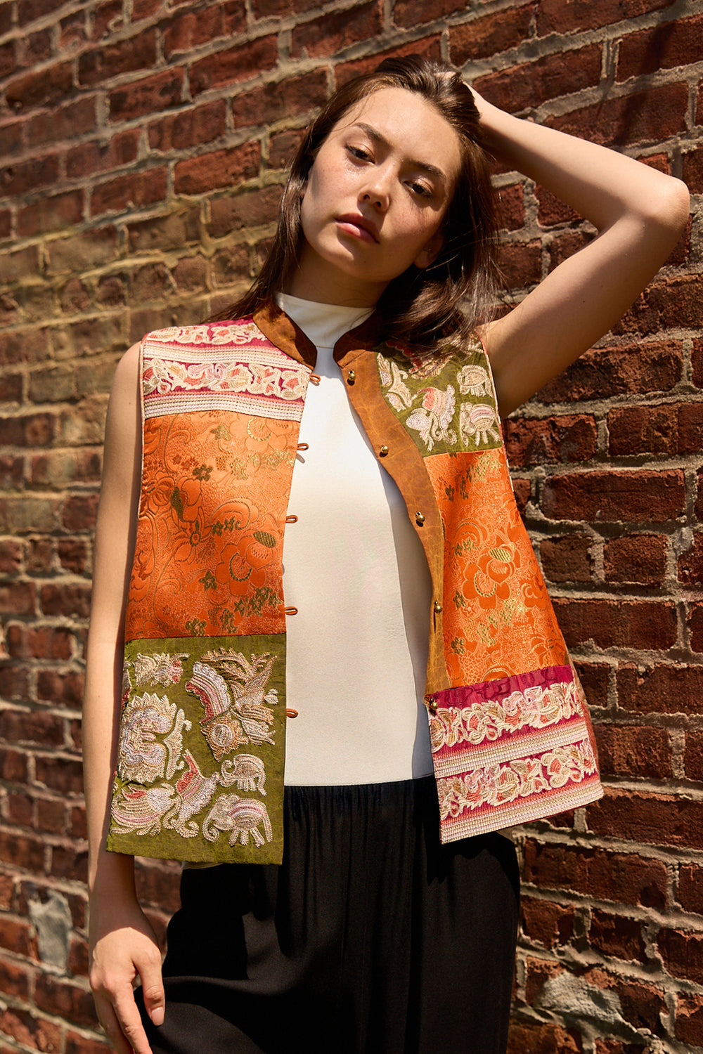 Du & Berry Embroidery Mulberry Silk Vest with floral patterns worn over a white top