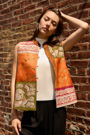 Du & Berry Embroidery Mulberry Silk Vest with floral patterns worn over a white top