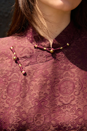 Du & Berry Jacquard Mulberry Silk Vest in Burgundy with intricate floral pattern and traditional button closures