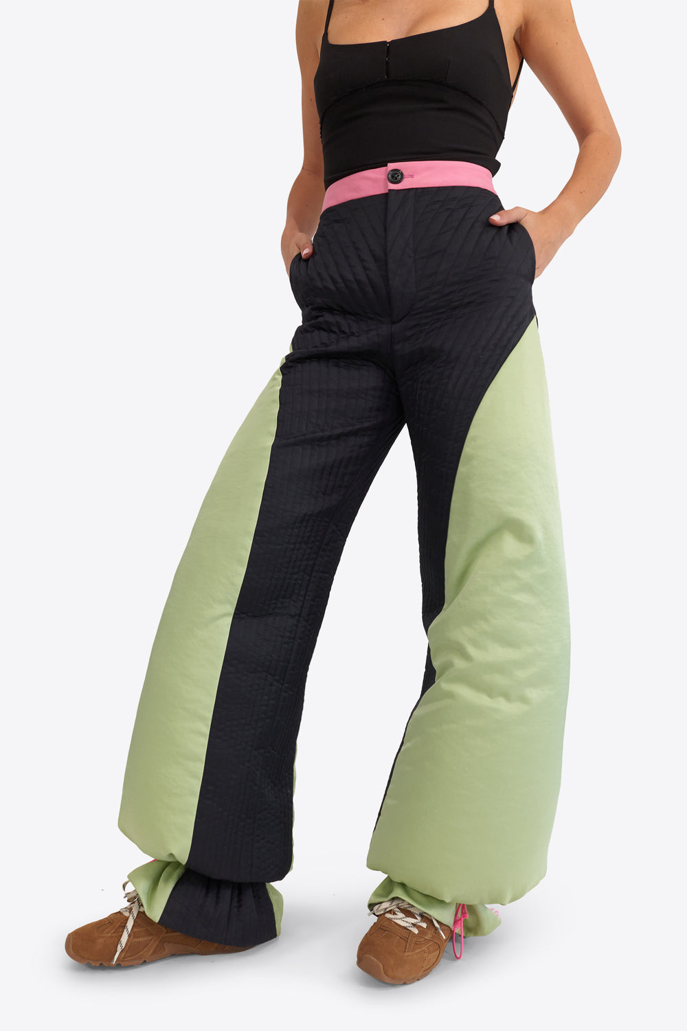 Du & Berry Origami Puffer Down Pants in black and green with pink waistband on model
