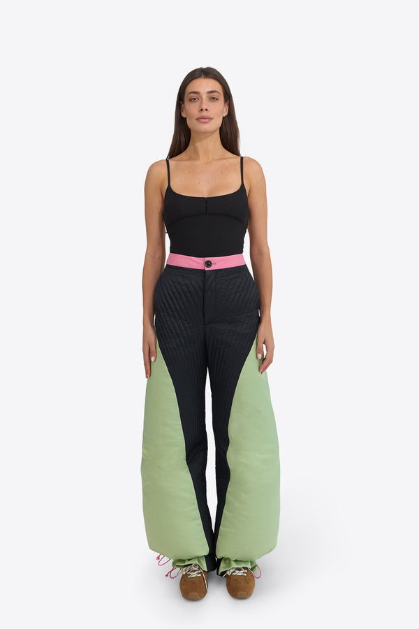 Du & Berry Origami Suit Set featuring black fitted top and uniquely designed pants with green padded panels