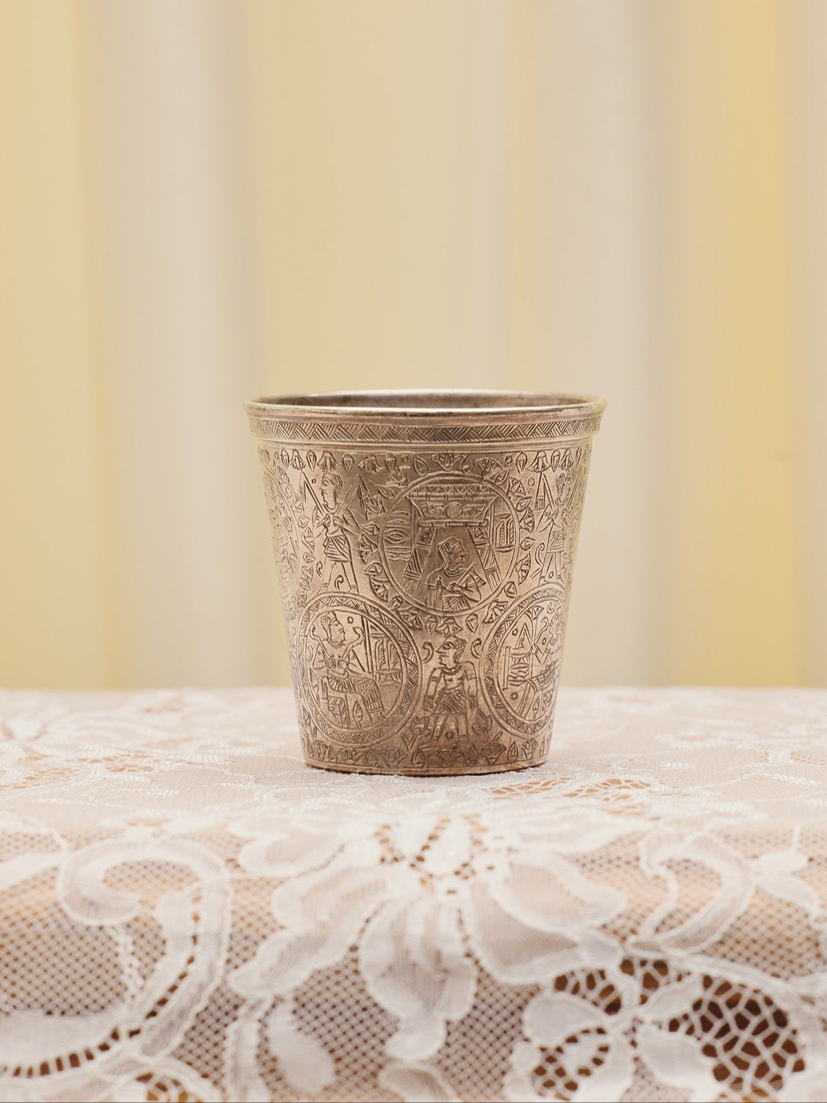 Table view Egyptian Revival Cup from Du & Berry's curated vintage collection. Showing Egyptian etchings all over cup