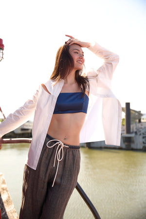 Du and Berry casual brown drawstring trousers worn by woman with white shirt and blue top outdoors