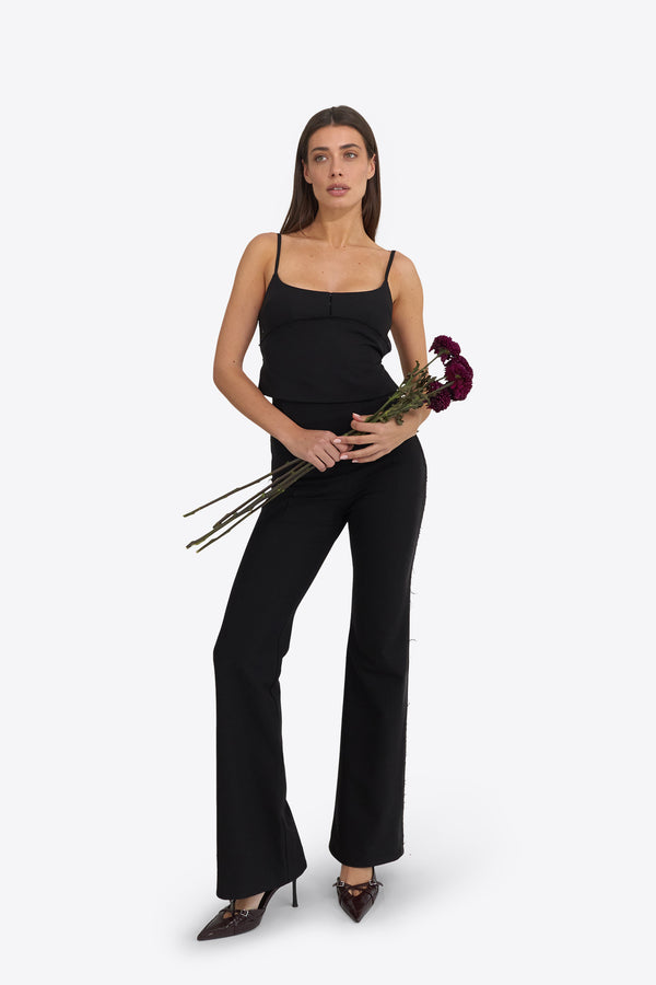 Du & Berry set featuring high-rise soft-flared pant and a structured open-back top in black